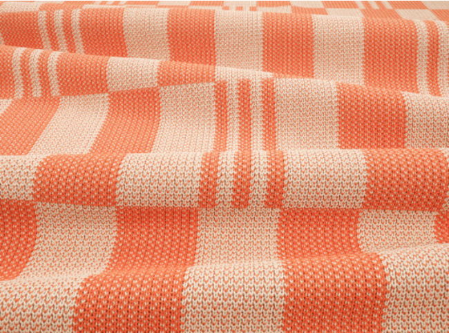 Checkerboard Knit Tangelo Fabric by Kirkby Design